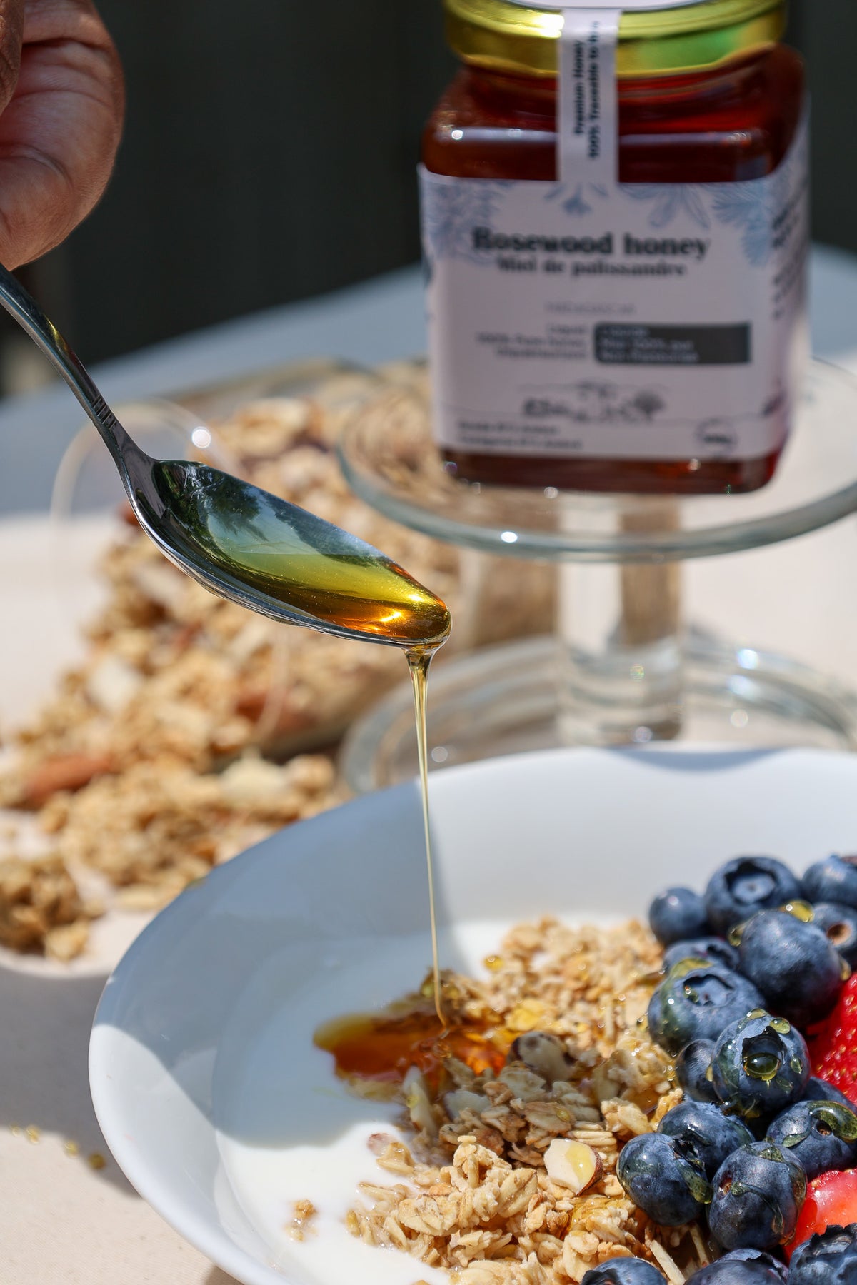 Rosewood honey drizzled over yogurt, granola and fresh fruit