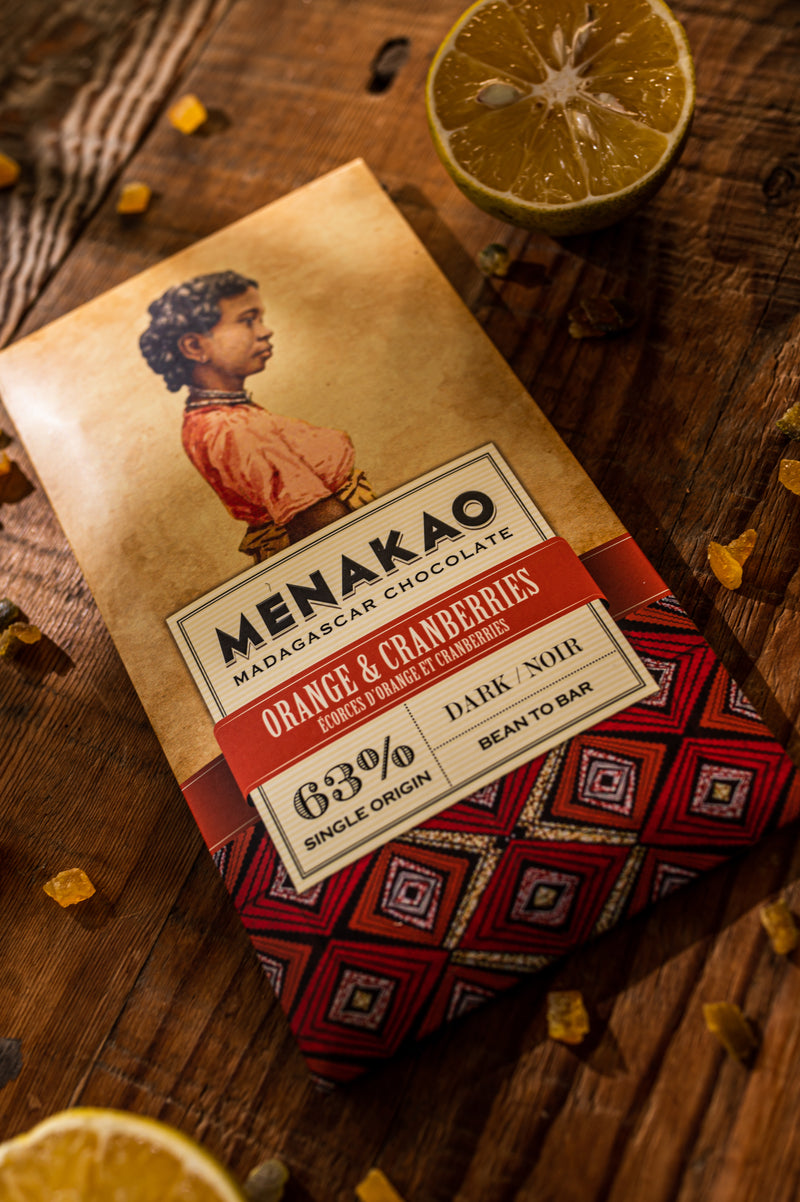 Close-up of 63% dark chocolate bar with orange and cranberry