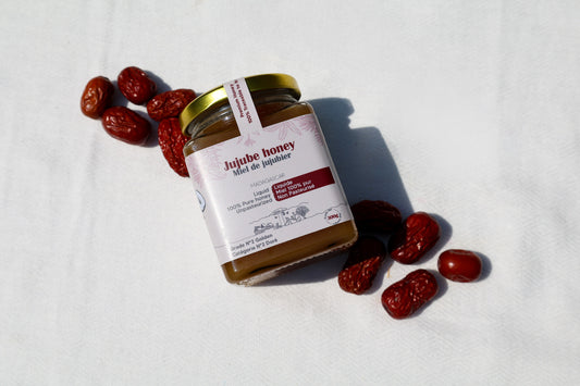 Jujube honey jar surrounded by Jujube
